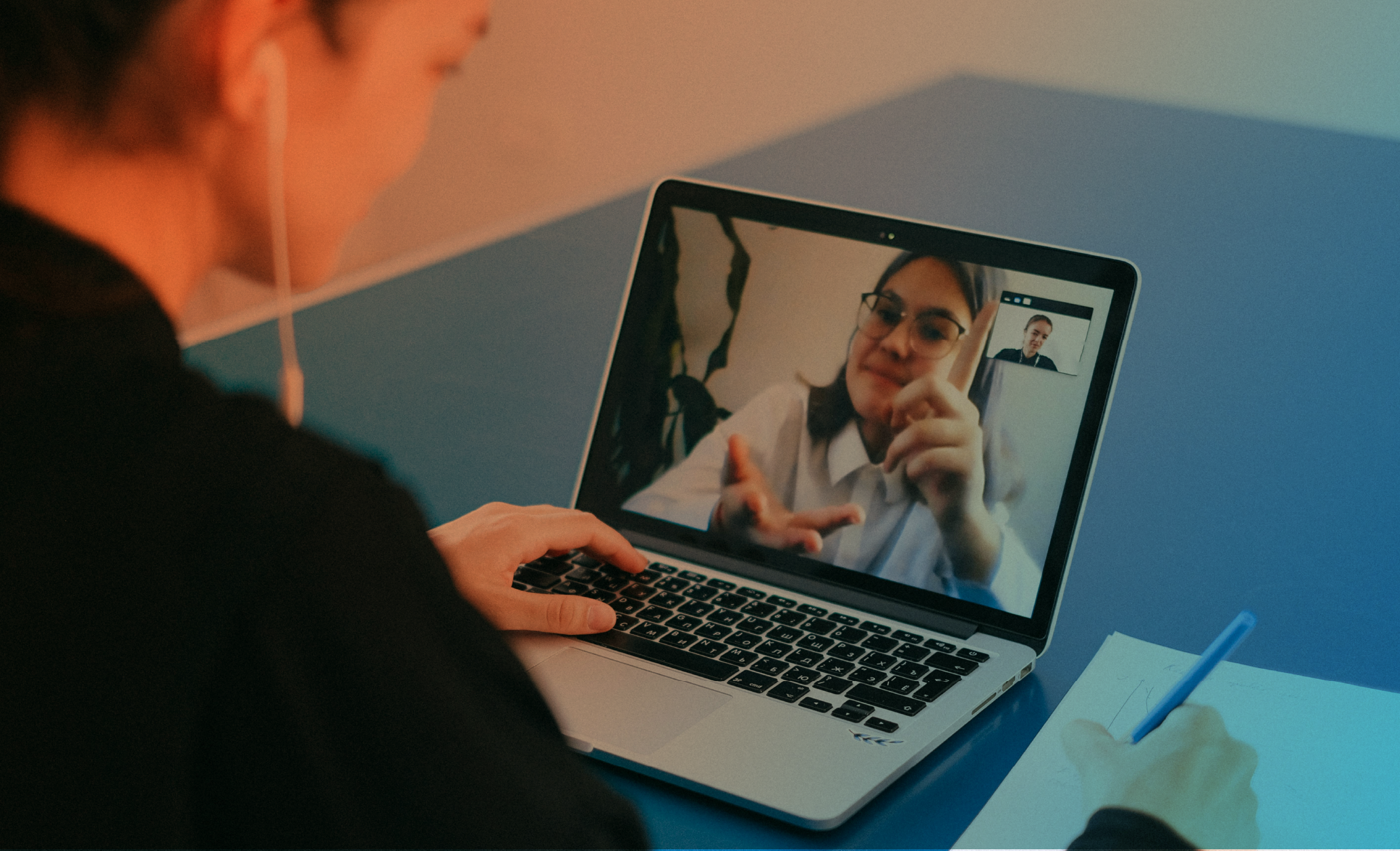 Person having a meeting on their laptop screen